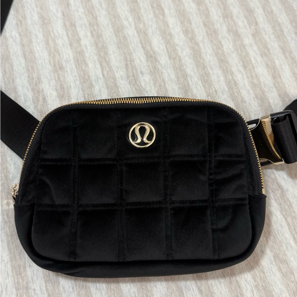 lululemon athletica Black Quilted Crossbody Bag with Gold Accents